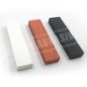 white orange and black sharpening stone